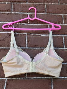 Cream lace bra.