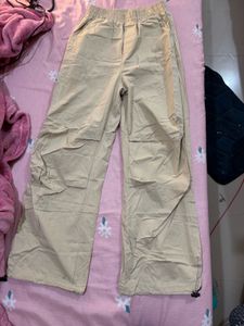 Beige parachute trousers