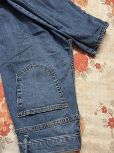 Ripped Knee Denim Jeans