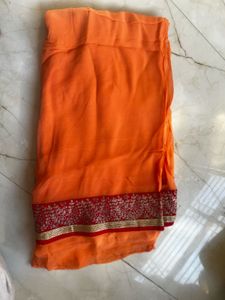 Elegant Orange Saree with stitched blouse