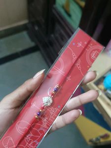 One Silver Rakhi And Other Is A Avengers Character