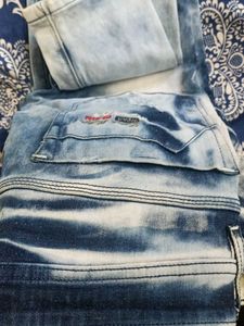 Distressed Blue Denim Jeans