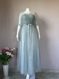 Soft tulle dusty blue gown