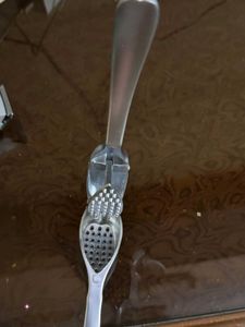 Kitchen garlic press