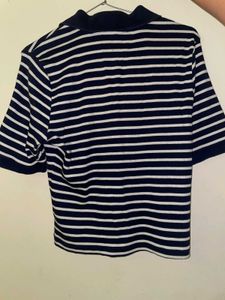 Stripes never go out of style Grab this classy pol
