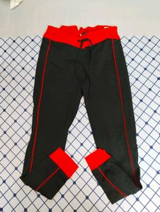 Black Payjama With Red Borders .