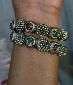 2 Pairs Of Silver Bangles