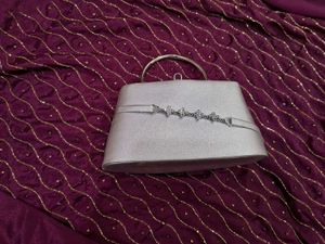 Elegant Purple Kurta Set with bridal clutch freebe