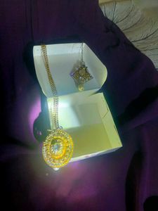 Golden neckpiece with matching Mangtika.