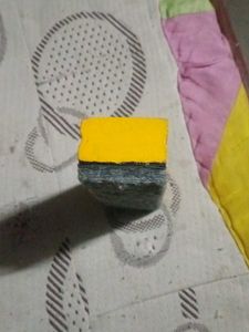 Yellow Wooden Block. Black board duster