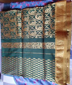 Selling A Beautiful Green Banarsi Saree