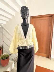 Yellow long sleeve bodysuit