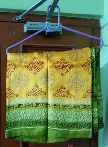 Mustard Yellow Tribal print Saree with Olive Green