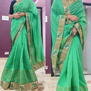 Elegant Green Silk Saree with Elephant Border