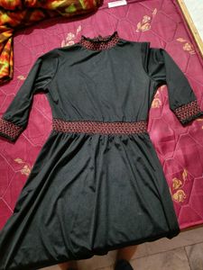Elegant Black Dress with Red Embroidery