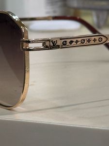 Louis Vuitton Gold Monogram Pilot Sunglasses