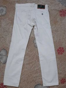 Distressed White Denim Jeans