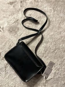 Black Kiss Sling Bag