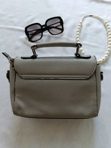 Grey Hand Held Bag