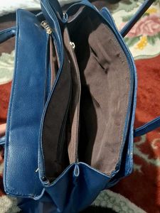Blue Quilted Handbag of Nelle Harper