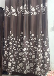 Floral Print Curtain Along With Sofa Cusion