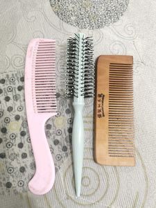 A Set Of 3 COMBS