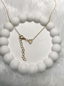 Gold Heart Pendant Necklace