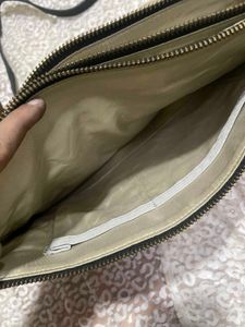 100% leather sling bag