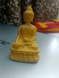 Buddha Idol And Bubble Candle