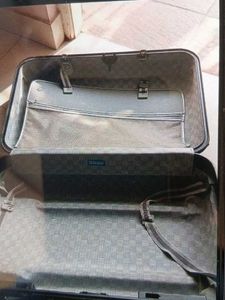 Black suitcase for tourism