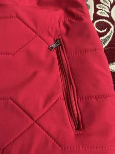 Red quilted long jacket