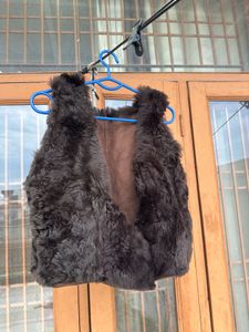 combo of Fur half jacket and Grey back strip top