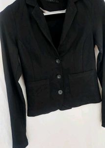 Black Blazer with Notched Lapels and Front Pockets