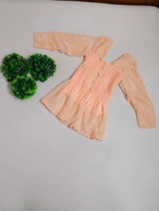 Peach Smocked Peplum Top