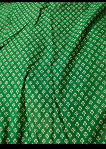 Elegant Green Saree with Flower Design
