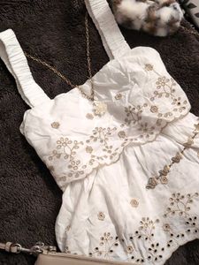White Embroidered Peplum Top