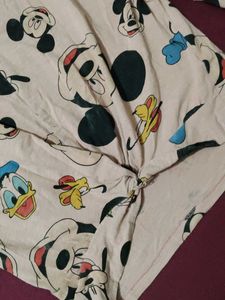A Crop Top With Elegant Front Knot Nd Puff Sleeves