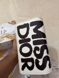 Miss Dior Clutch sling bag