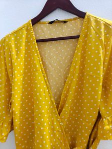 Harpa Yellow polka wrap top