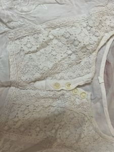 White Embroidered Sleeveless Top