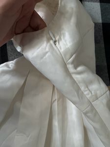 Pretty White Dress With Back Bow Design