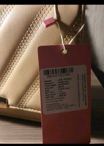 Lino Perros Quilted Sling Bag
