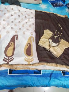 Preety Brown N White Saree