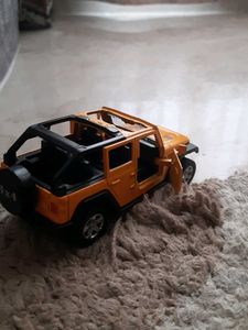Yellow Jeep Wrangler Toy Model