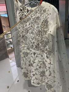 cream full hand work Chaniya choli wid net dupatta