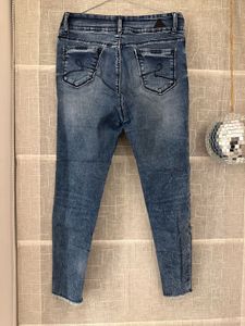 Distressed Wash Jeans