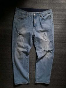 Ripped Light Wash Denim Jeans