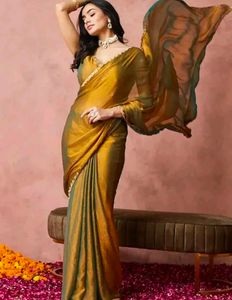 Trendy golden Saree with designer blouse