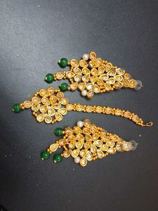 Green Pearled Kundan Earrings And Mangtika