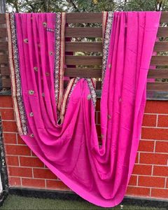 Rani Saree With Embellished Border And Blouse